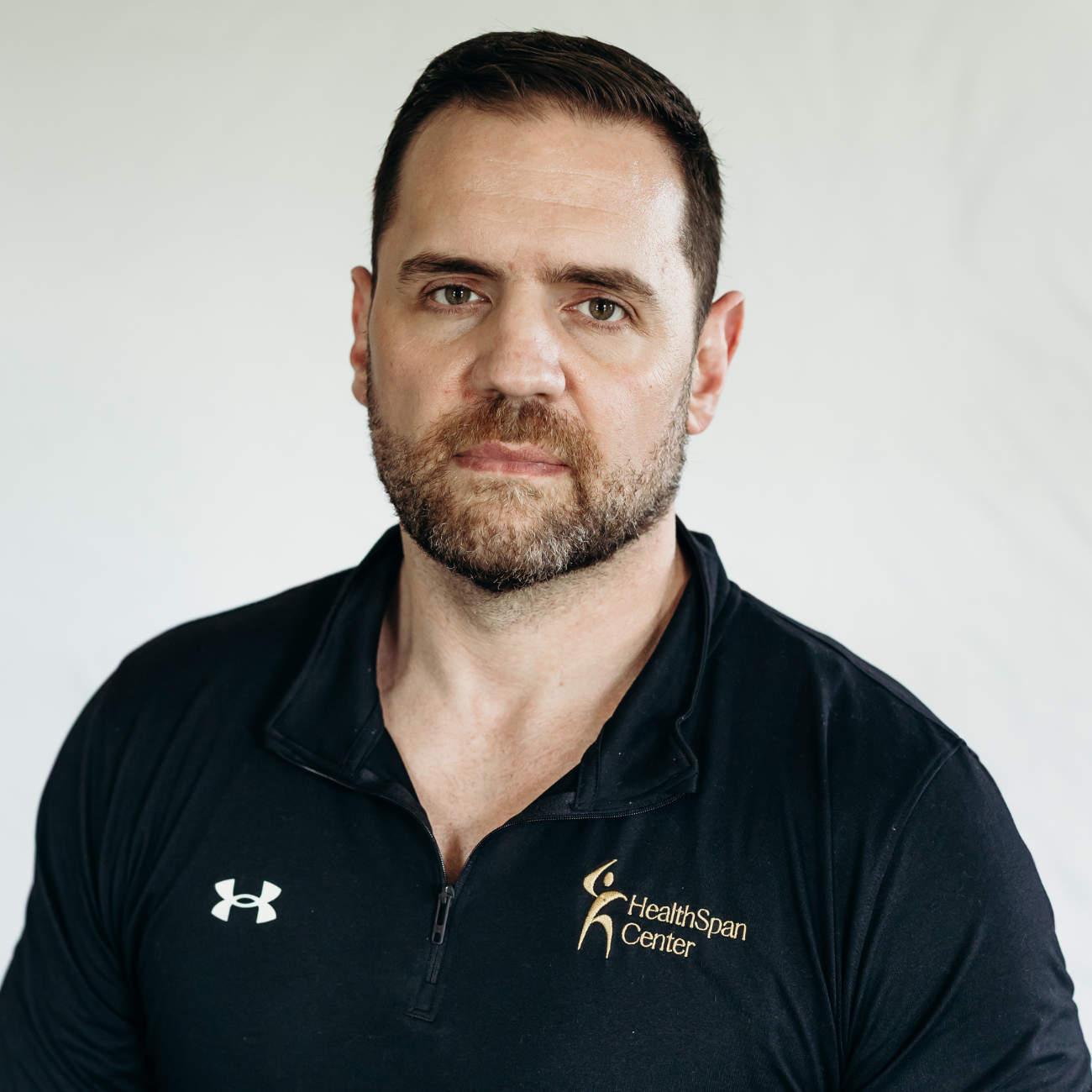 athletic man not smiling